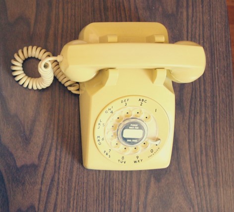 Overhead image of a land line phone. Image courtesy Microsoft 365.